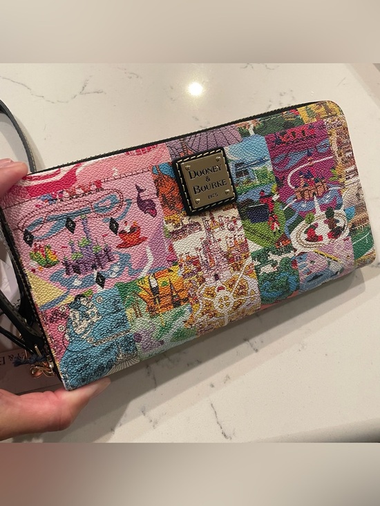 Dooney & Bourke Handbags - NWT Dooney and Bourke Disney Parks Vintage Park Map Wallet Wristlet 2026